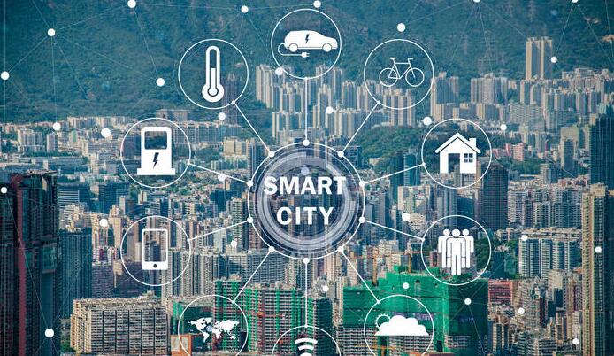What role does the IoT play in the development of smart cities?